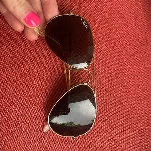 Gold Ray Ban aviators!